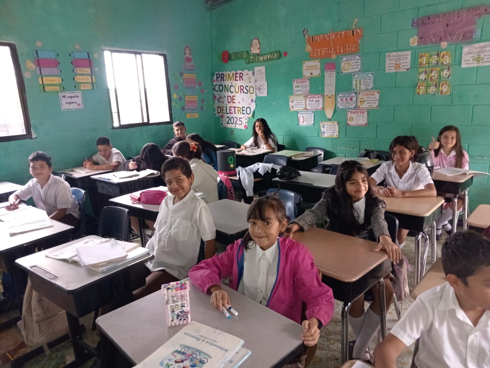 Students in La Palma, El Salvador using desks once used in Missouri classrooms.
