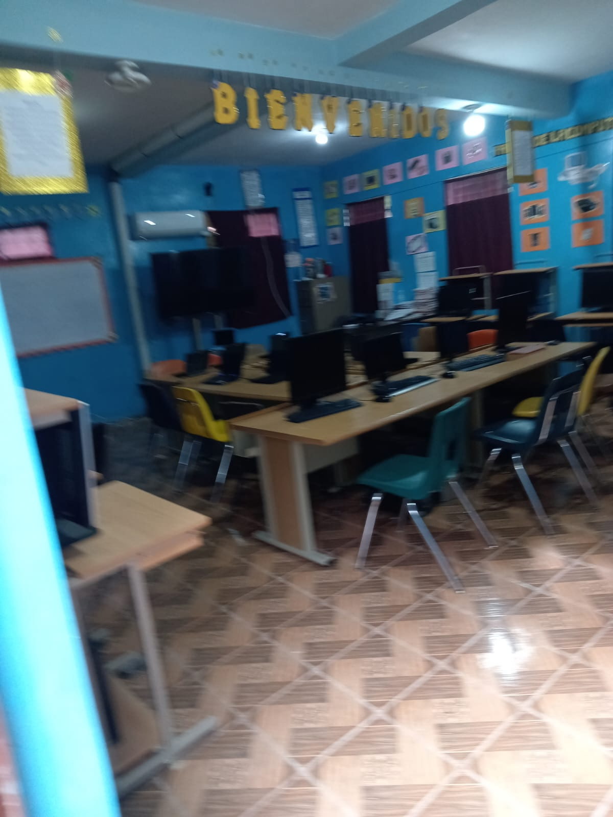 Students in La Palma, El Salvador using desks once used in Missouri classrooms.